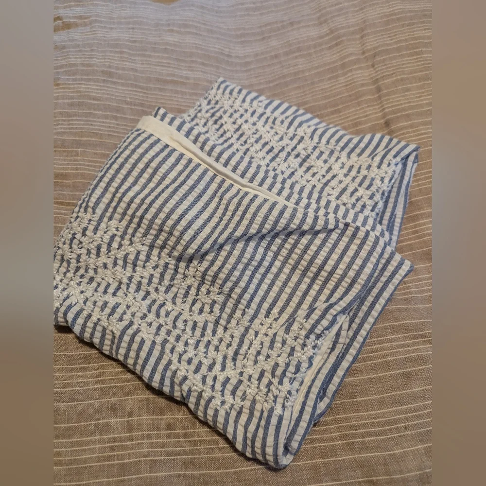 Pair of Nicole Miller embroidered seersucker cotton stripe shams